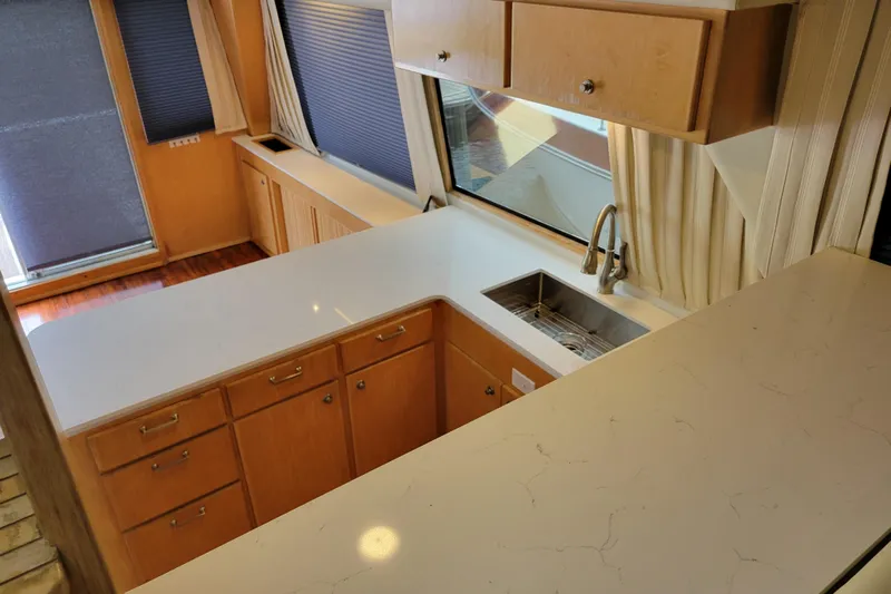  Yacht Photos Pics Spacious kitchen in 1997 Navigator 5000 Classic with modern countertops and ample storage.