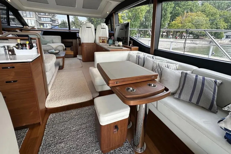  Yacht Photos Pics Luxurious interior of 2017 Princess S60 yacht with elegant seating and modern amenities.