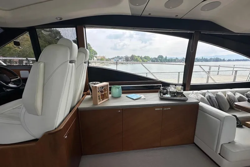 Yacht Photos Pics Luxurious interior of 2017 Princess S60 yacht with scenic water view.
