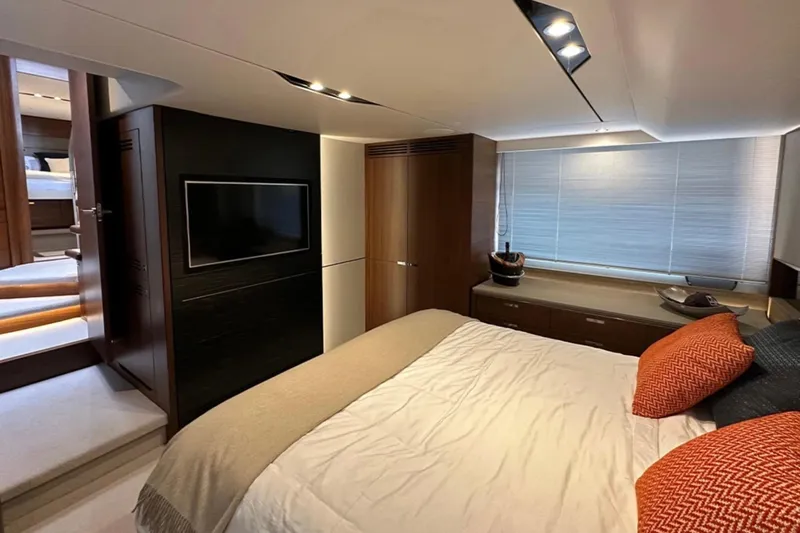  Yacht Photos Pics Luxurious 2017 Princess S60 yacht bedroom with modern decor and natural lighting.