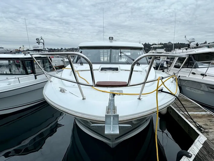 September II Yacht Photos Pics 2018 Jeanneau NC 11 boat docked at marina, front view.