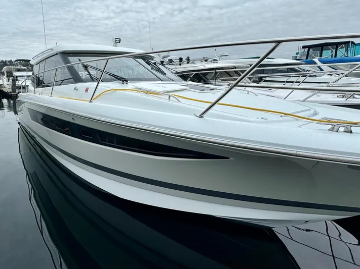 September II Yacht Photos Pics 2018 Jeanneau NC 11 boat docked in a marina.