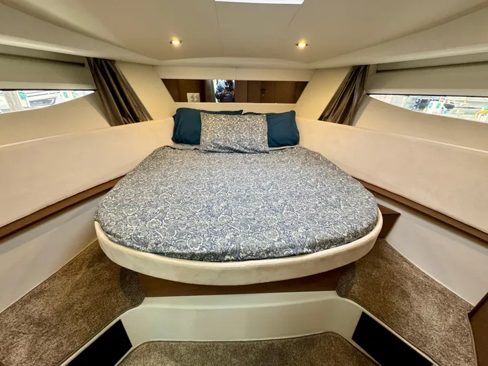 September II Yacht Photos Pics 2018 Jeanneau NC 11 master cabin with a cozy bed and modern design.