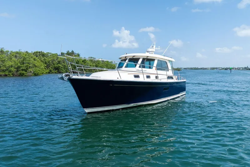 Five O'clock Yacht Photos Pics 2013 Sabre 38 Salon Express yacht cruising on a sunny day.