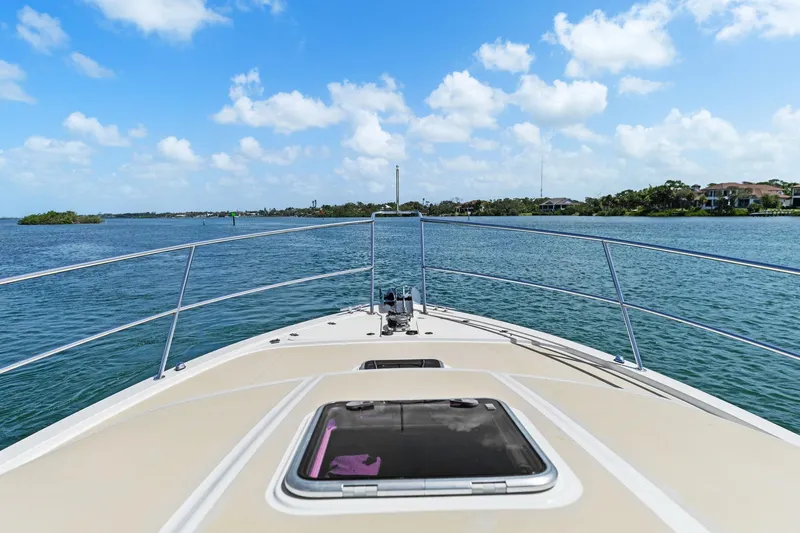 Five O'clock Yacht Photos Pics Bow view of 2013 Sabre 38 Salon Express cruising on a sunny day.