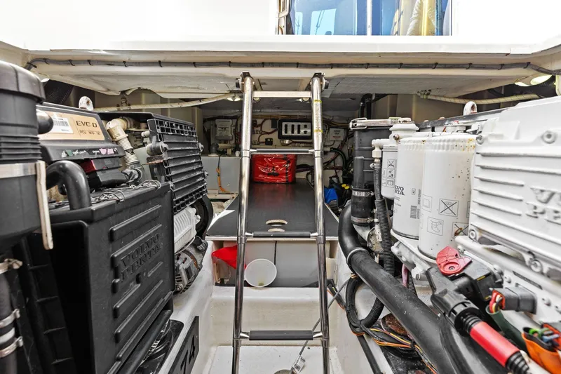 Five O'clock Yacht Photos Pics Engine room of 2013 Sabre 38 Salon Express with Volvo Penta components and ladder access.