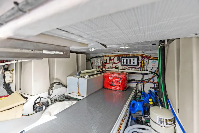 Five O'clock Yacht Photos Pics Engine room of 2013 Sabre 38 Salon Express, showcasing wiring and equipment.