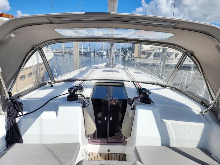 Just A Sign Yacht Photos Pics Cockpit view of 2022 Beneteau Oceanis 40.1 sailboat docked at marina.