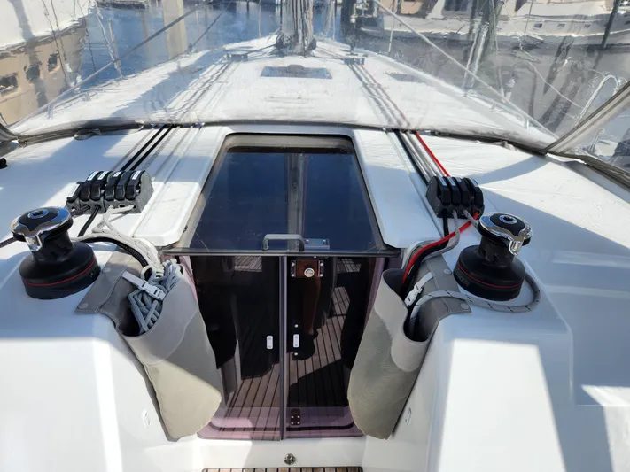 Just A Sign Yacht Photos Pics Cockpit view of 2022 Beneteau Oceanis 40.1 sailboat with winches and ropes.