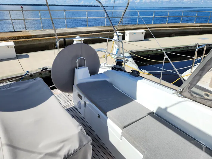 Just A Sign Yacht Photos Pics Beneteau Oceanis 40.1 yacht deck, 2022 model, docked at marina with clear blue water.