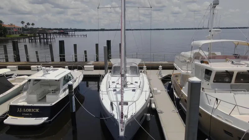 Just A Sign Yacht Photos Pics Beneteau Oceanis 40.1 yacht docked at marina, 2022 model, surrounded by other boats.