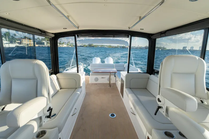 In-stock 2026 Mjm 3-053 Yacht Photos Pics Interior of 2026 MJM 3 boat with luxurious seating and ocean view.