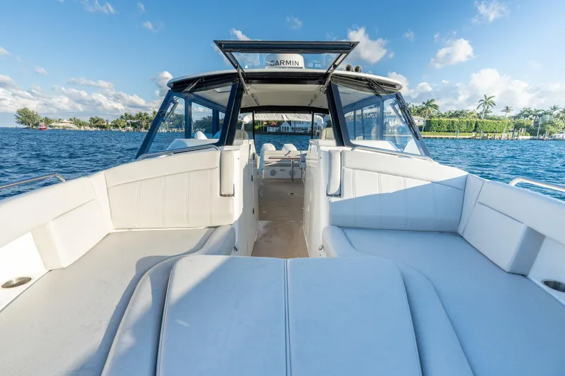 In-stock 2026 Mjm 3-053 Yacht Photos Pics Luxury MJM 3 boat cruising on a sunny day, 2026 model, with spacious seating.