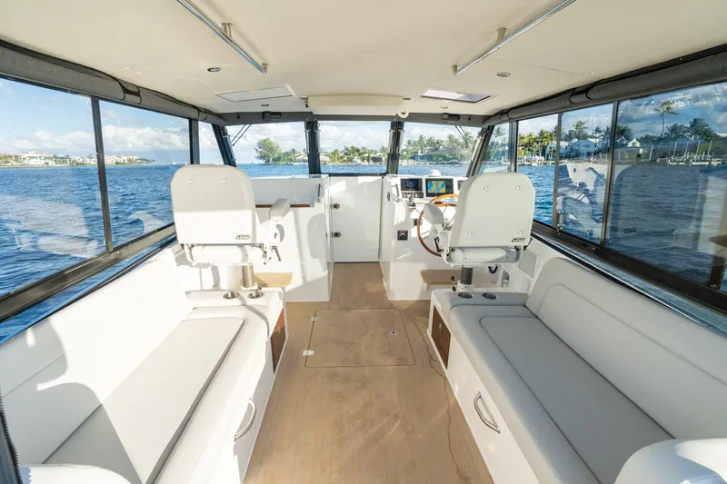 In-stock 2026 Mjm 3-053 Yacht Photos Pics Interior of 2026 MJM 3 boat with spacious seating and panoramic windows.