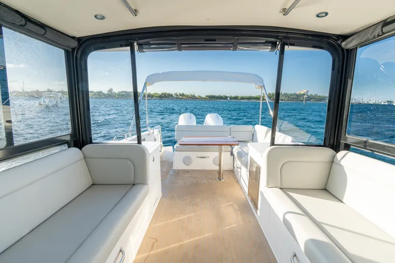 In-stock 2026 Mjm 3-053 Yacht Photos Pics Luxurious interior of 2026 MJM 3 yacht with ocean view and comfortable seating.