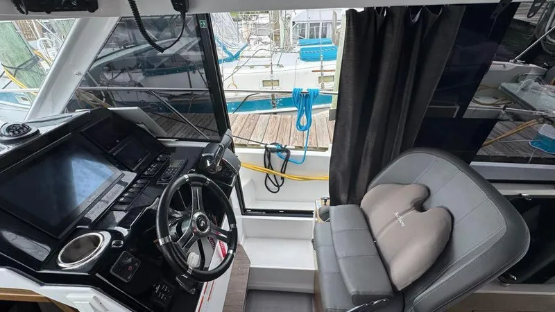 Sterling Lady Ix Yacht Photos Pics 2024 Beneteau Antares 9 Helm with Sliding Door to Side Deck