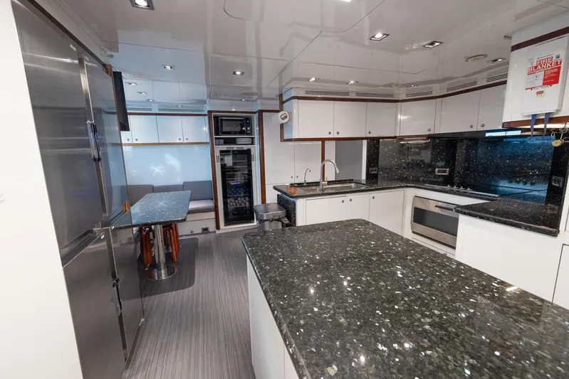 Benetti Classic Yacht Photos Pics Luxurious kitchen interior of 2008 Benetti Classic yacht with modern appliances and granite countertops.