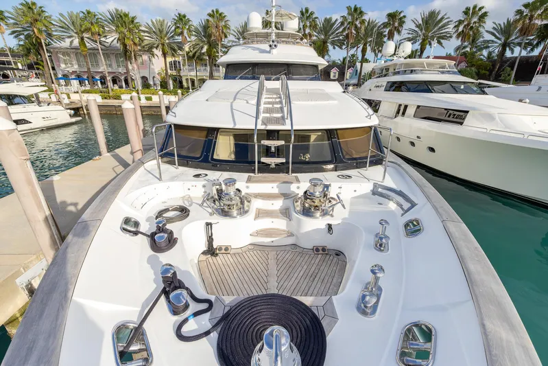 Benetti Classic Yacht Photos Pics Luxurious 2008 Benetti Classic yacht docked at a marina with palm trees.