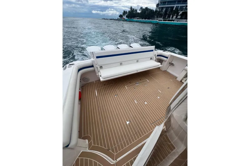  Yacht Photos Pics 2017 Intrepid 475 Sport Yacht deck with seating, cruising on open water.