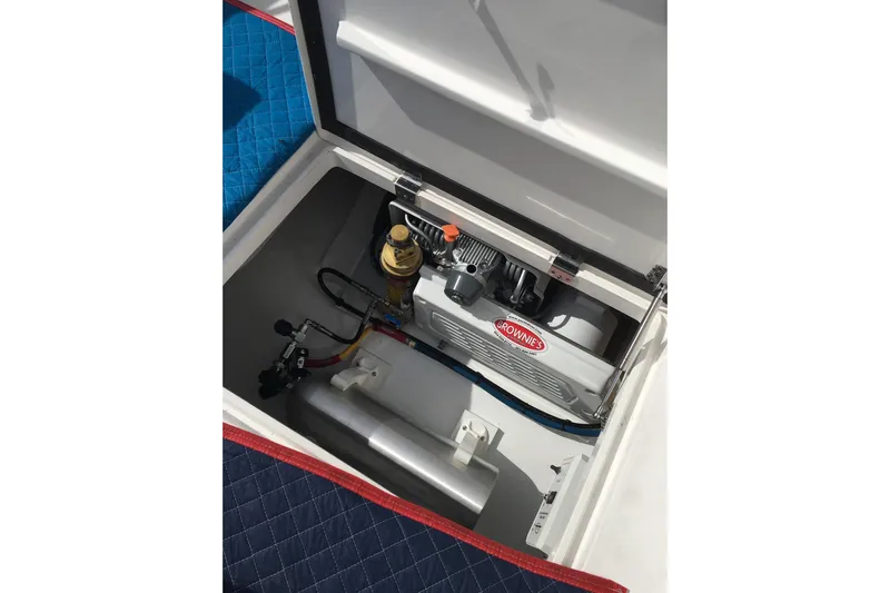  Yacht Photos Pics Engine compartment of 2017 Intrepid 475 Sport Yacht, featuring a Brownie's compressor.