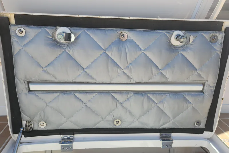  Yacht Photos Pics Quilted interior panel of 2017 Intrepid 475 Sport Yacht with metal fixtures.