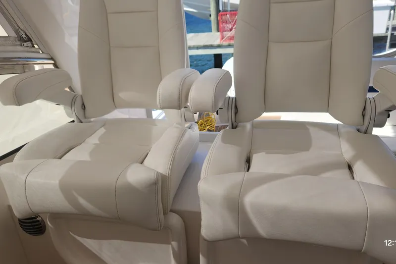  Yacht Photos Pics Luxury white seats on a 2017 Intrepid 475 Sport Yacht.