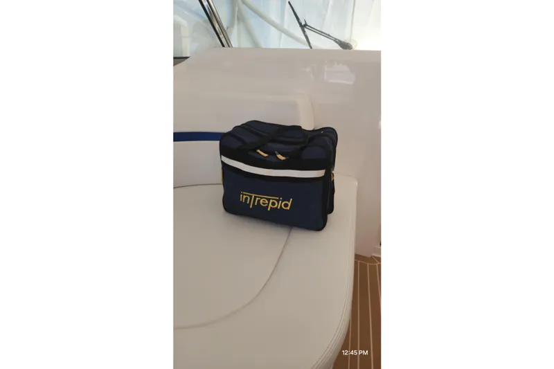  Yacht Photos Pics Blue Intrepid bag on 2017 Intrepid 475 Sport Yacht seat.