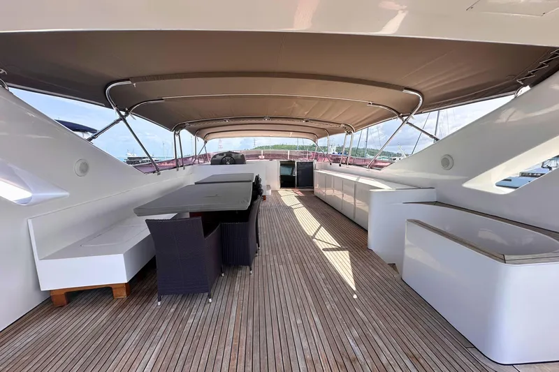 Celebrity Yacht Photos Pics Spacious deck of 2001 Ses Yachts custom model with seating and canopy.