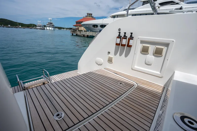 Starry Night Yacht Photos Pics Lagoon 46 yacht deck, 2022 model, docked at marina with scenic ocean view.