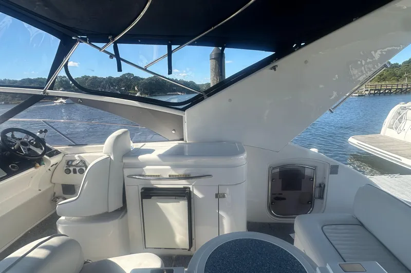  Yacht Photos Pics Interior view of 2006 Fairline Targa 40 yacht, featuring helm and seating area.