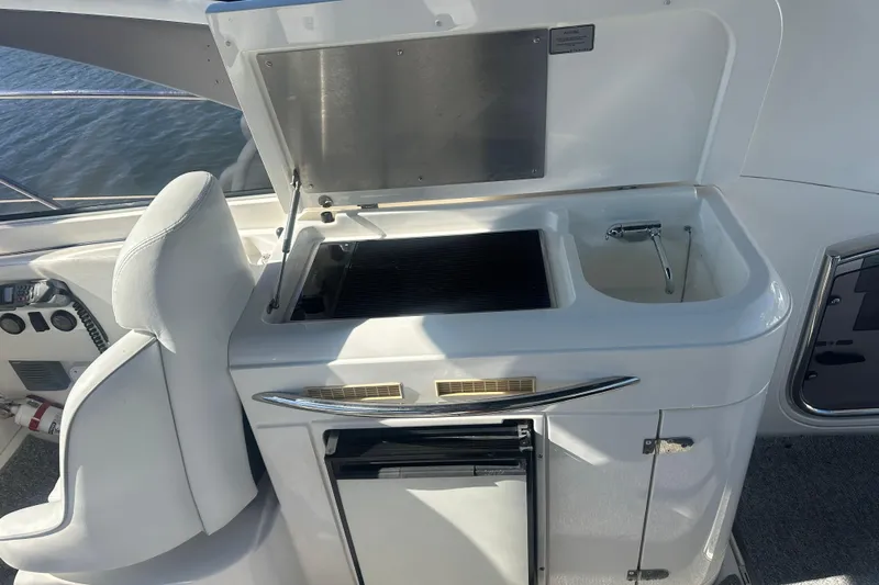  Yacht Photos Pics Outdoor kitchenette on 2006 Fairline Targa 40 yacht with sink and grill.