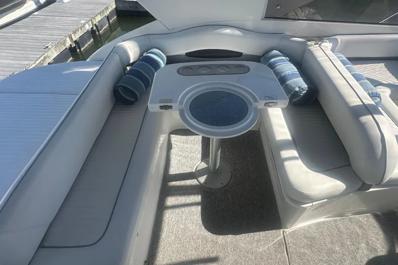  Yacht Photos Pics Luxurious seating area on a 2006 Fairline Targa 40 yacht with blue cushions.