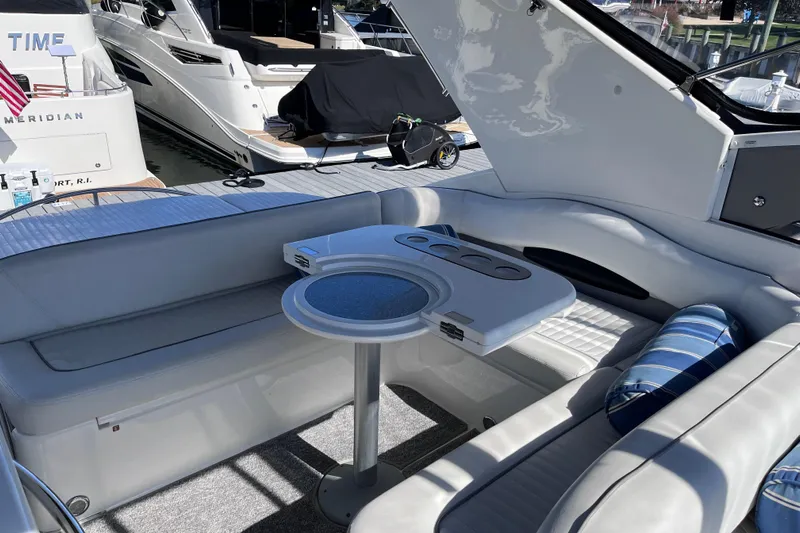  Yacht Photos Pics Luxurious 2006 Fairline Targa 40 yacht interior with elegant seating and table setup.