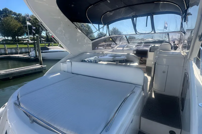  Yacht Photos Pics 2006 Fairline Targa 40 yacht interior with seating and table, docked at marina.