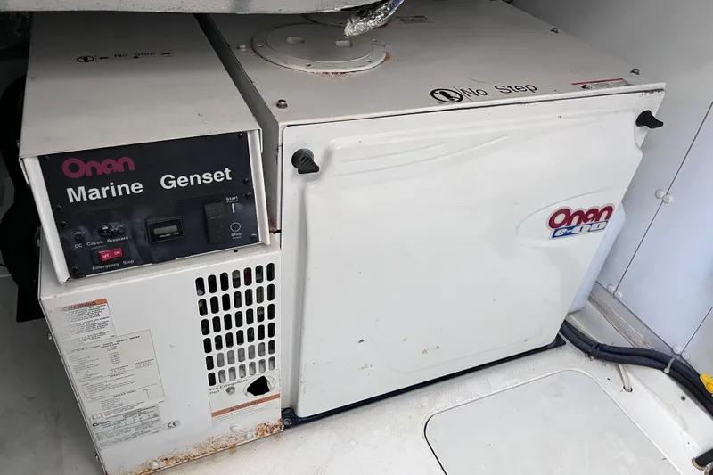  Yacht Photos Pics Onan marine generator in a 2006 Fairline Targa 40 yacht engine room.