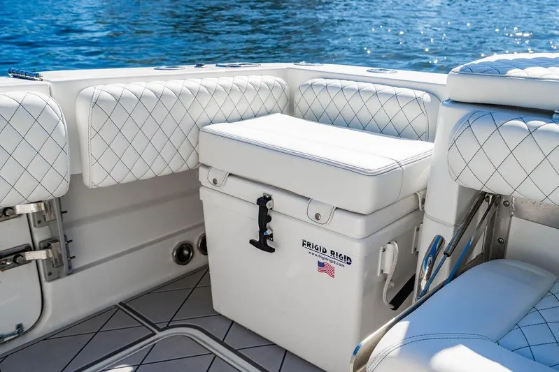  Yacht Photos Pics Luxurious seating on 2024 HCB 42 Lujo boat with Frigid Rigid cooler.