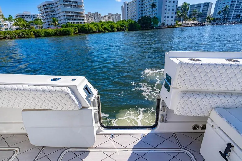  Yacht Photos Pics 2024 HCB 42 Lujo boat interior with waterfront view, featuring luxurious seating and modern design.