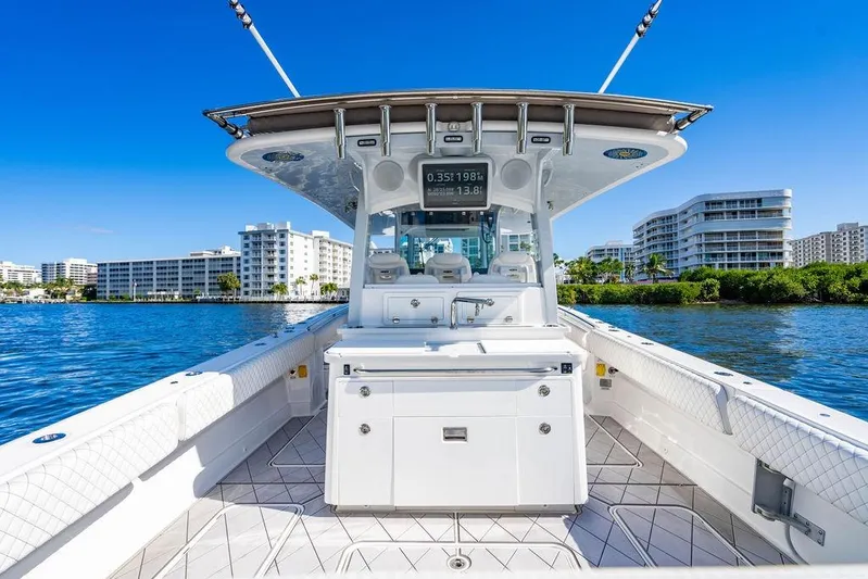  Yacht Photos Pics 2024 HCB 42 Lujo boat on water, modern design, cityscape background.