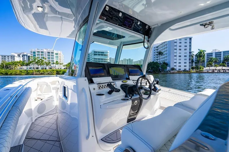  Yacht Photos Pics 2024 HCB 42 Lujo boat interior with modern dashboard and waterfront view.