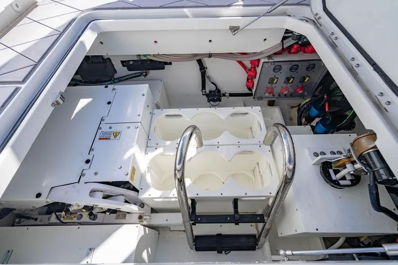  Yacht Photos Pics 2024 HCB 42 Lujo boat engine compartment with control panel and storage.