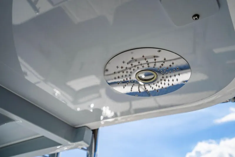  Yacht Photos Pics 2024 HCB 42 Lujo boat ceiling with modern light fixture, showcasing sleek design.