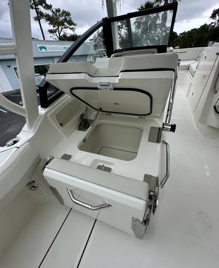  Yacht Photos Pics 2025 World Cat 260 DC-X boat with open storage compartment on deck.