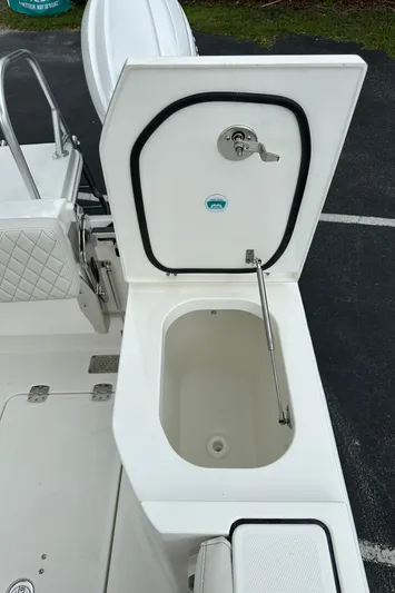  Yacht Photos Pics 2025 World Cat 260 DC-X boat storage compartment with open lid.