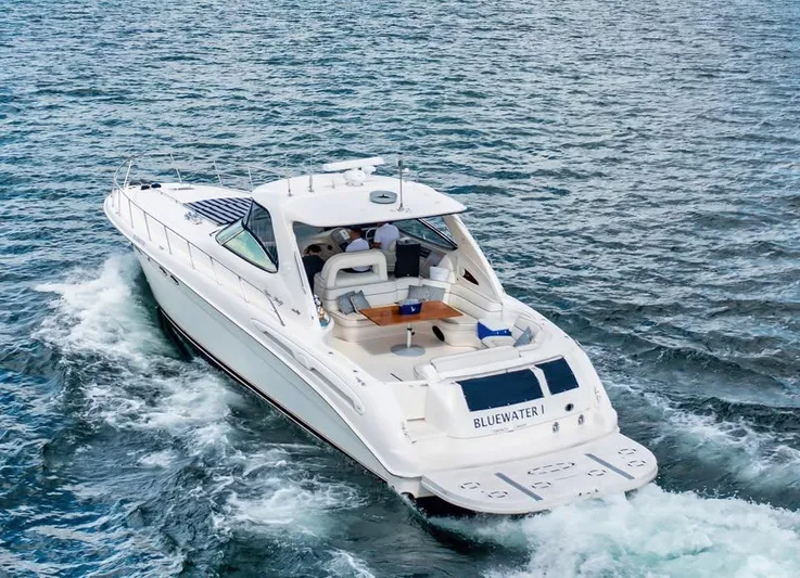  Yacht Photos Pics 2000 Sea Ray 540 Sundancer yacht cruising on open water.