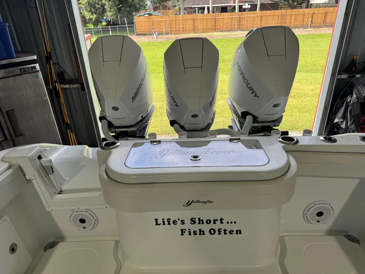  Yacht Photos Pics 2020 Yellowfin 36 Offshore boat with triple Mercury engines, "Life's Short... Fish Often" text.