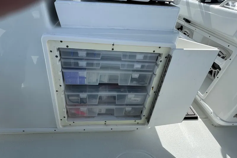  Yacht Photos Pics Storage compartment with tackle boxes on a 2020 Yellowfin 36 Offshore boat.