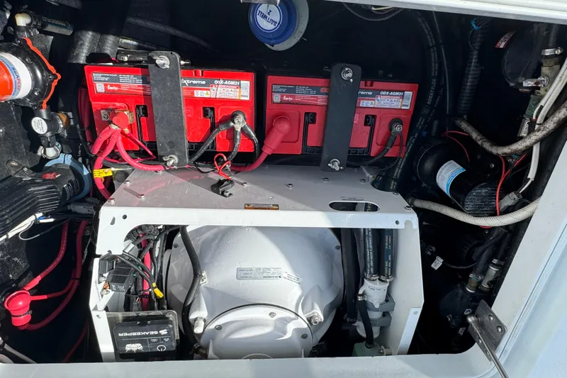 Yacht Photos Pics Engine compartment of a 2020 Yellowfin 36 Offshore boat with batteries and wiring.