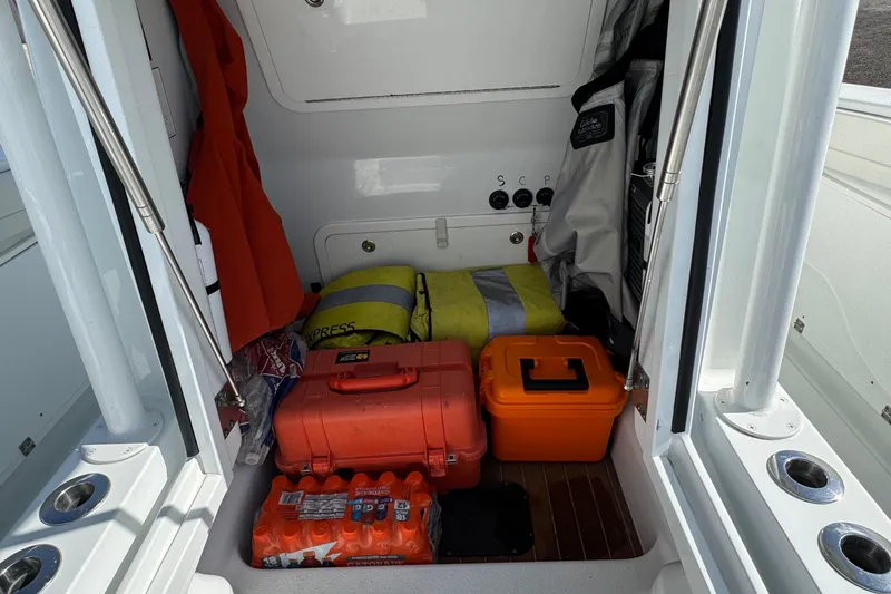  Yacht Photos Pics Storage area of 2020 Yellowfin 36 Offshore boat with safety gear and supplies.