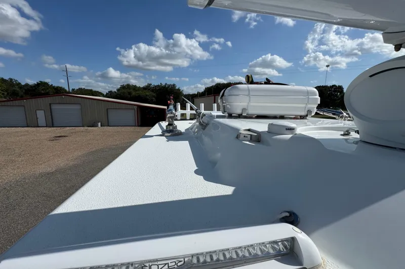  Yacht Photos Pics 2020 Yellowfin 36 Offshore boat deck with clear sky and storage buildings.