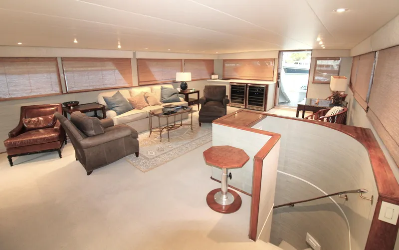 Freedom Yacht Photos Pics Luxurious interior of 1979 Burger Raised Pilothouse yacht with elegant seating and decor.